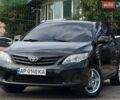 Черный Тойота Королла, объемом двигателя 1.33 л и пробегом 213 тыс. км за 5499 $, фото 1 на Automoto.ua