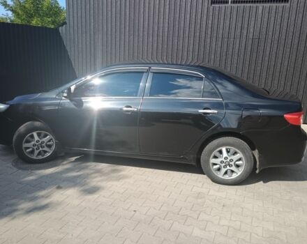 Черный Тойота Королла, объемом двигателя 1.3 л и пробегом 210 тыс. км за 6470 $, фото 1 на Automoto.ua