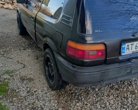 Черный Тойота Королла, объемом двигателя 1.3 л и пробегом 300 тыс. км за 800 $, фото 10 на Automoto.ua