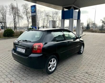 Чорний Тойота Королла, об'ємом двигуна 2 л та пробігом 2 тис. км за 2300 $, фото 4 на Automoto.ua