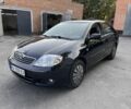 Черный Тойота Королла, объемом двигателя 1.6 л и пробегом 293 тыс. км за 4700 $, фото 1 на Automoto.ua