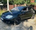 Черный Тойота Королла, объемом двигателя 1.6 л и пробегом 265 тыс. км за 5500 $, фото 1 на Automoto.ua