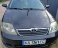 Чорний Тойота Королла, об'ємом двигуна 1.6 л та пробігом 235 тис. км за 4800 $, фото 7 на Automoto.ua