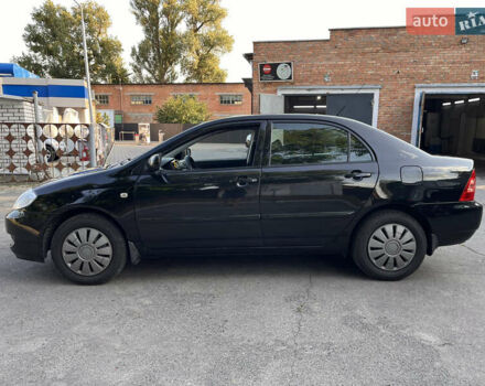 Чорний Тойота Королла, об'ємом двигуна 1.6 л та пробігом 293 тис. км за 4700 $, фото 5 на Automoto.ua