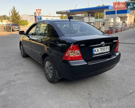 Чорний Тойота Королла, об'ємом двигуна 1.6 л та пробігом 293 тис. км за 4700 $, фото 4 на Automoto.ua