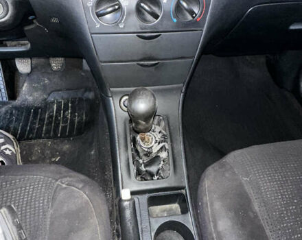 Черный Тойота Королла, объемом двигателя 1.59 л и пробегом 521 тыс. км за 3537 $, фото 14 на Automoto.ua