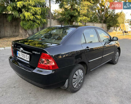 Чорний Тойота Королла, об'ємом двигуна 1.6 л та пробігом 293 тис. км за 4700 $, фото 2 на Automoto.ua
