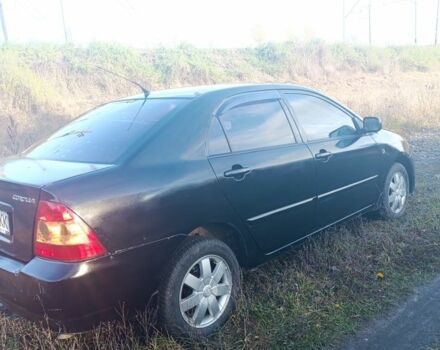 Черный Тойота Королла, объемом двигателя 1.6 л и пробегом 200 тыс. км за 3200 $, фото 4 на Automoto.ua