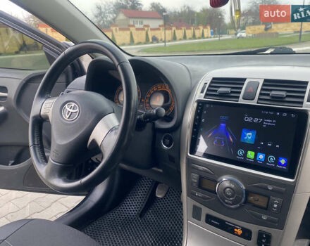 Чорний Тойота Королла, об'ємом двигуна 1.6 л та пробігом 138 тис. км за 8700 $, фото 15 на Automoto.ua