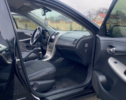 Чорний Тойота Королла, об'ємом двигуна 1.6 л та пробігом 138 тис. км за 8700 $, фото 23 на Automoto.ua