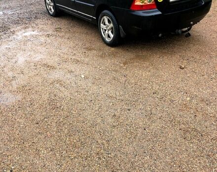 Черный Тойота Королла, объемом двигателя 1.6 л и пробегом 265 тыс. км за 3900 $, фото 2 на Automoto.ua