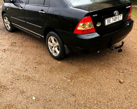 Чорний Тойота Королла, об'ємом двигуна 1.6 л та пробігом 265 тис. км за 3900 $, фото 3 на Automoto.ua