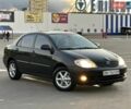 Черный Тойота Королла, объемом двигателя 1.6 л и пробегом 225 тыс. км за 5800 $, фото 1 на Automoto.ua