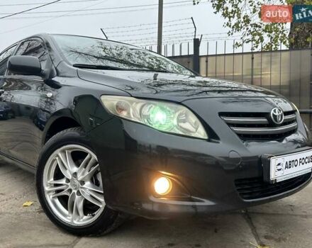 Чорний Тойота Королла, об'ємом двигуна 1.6 л та пробігом 316 тис. км за 7490 $, фото 3 на Automoto.ua