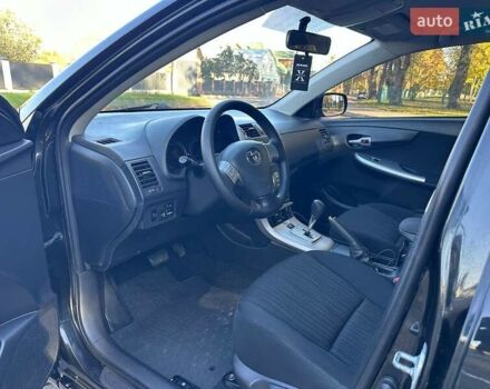 Чорний Тойота Королла, об'ємом двигуна 1.6 л та пробігом 193 тис. км за 5999 $, фото 25 на Automoto.ua