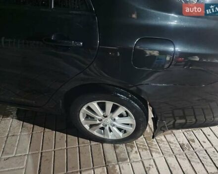 Чорний Тойота Королла, об'ємом двигуна 1.6 л та пробігом 207 тис. км за 6900 $, фото 8 на Automoto.ua