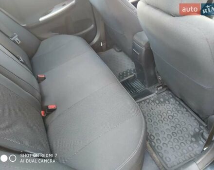 Чорний Тойота Королла, об'ємом двигуна 1.6 л та пробігом 215 тис. км за 7500 $, фото 7 на Automoto.ua