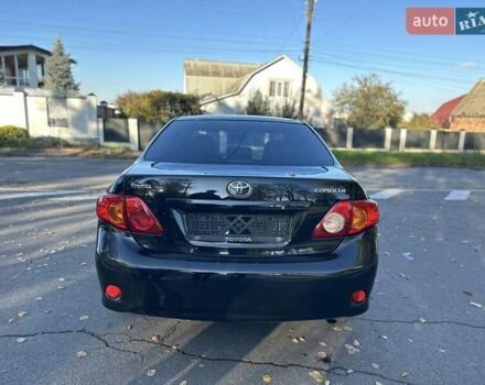 Чорний Тойота Королла, об'ємом двигуна 1.6 л та пробігом 193 тис. км за 5999 $, фото 34 на Automoto.ua