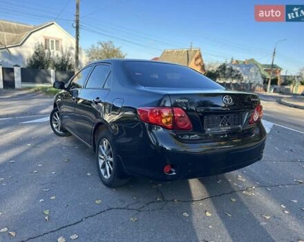 Чорний Тойота Королла, об'ємом двигуна 1.6 л та пробігом 193 тис. км за 5999 $, фото 33 на Automoto.ua
