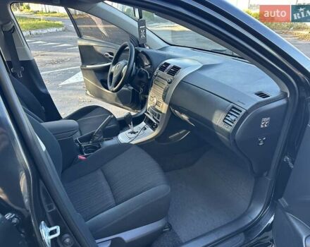 Чорний Тойота Королла, об'ємом двигуна 1.6 л та пробігом 193 тис. км за 5999 $, фото 26 на Automoto.ua