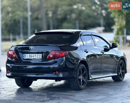 Чорний Тойота Королла, об'ємом двигуна 1.6 л та пробігом 221 тис. км за 6799 $, фото 2 на Automoto.ua