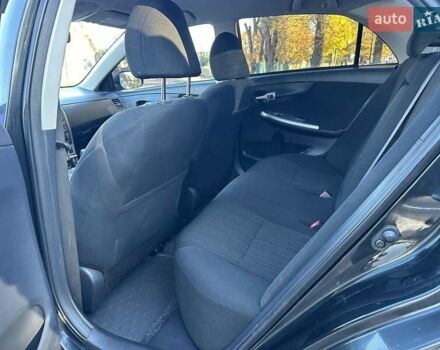 Чорний Тойота Королла, об'ємом двигуна 1.6 л та пробігом 193 тис. км за 5999 $, фото 13 на Automoto.ua