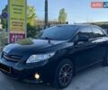 Черный Тойота Королла, объемом двигателя 1.6 л и пробегом 177 тыс. км за 6990 $, фото 1 на Automoto.ua