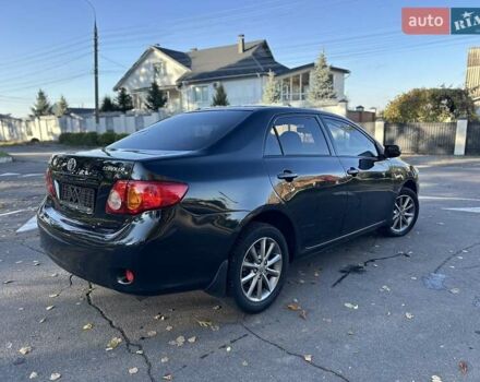 Чорний Тойота Королла, об'ємом двигуна 1.6 л та пробігом 193 тис. км за 5999 $, фото 47 на Automoto.ua
