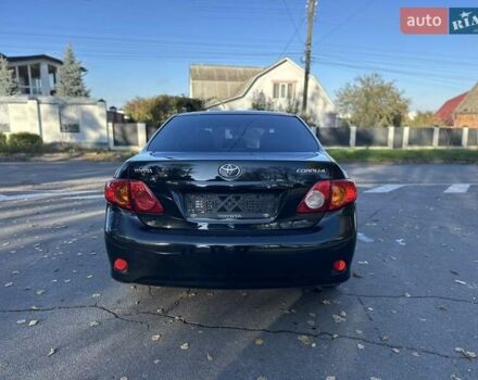 Чорний Тойота Королла, об'ємом двигуна 1.6 л та пробігом 193 тис. км за 5999 $, фото 41 на Automoto.ua
