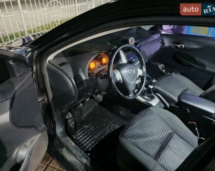 Чорний Тойота Королла, об'ємом двигуна 1.6 л та пробігом 207 тис. км за 6900 $, фото 7 на Automoto.ua