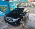 Черный Тойота Королла, объемом двигателя 1.6 л и пробегом 207 тыс. км за 6499 $, фото 1 на Automoto.ua