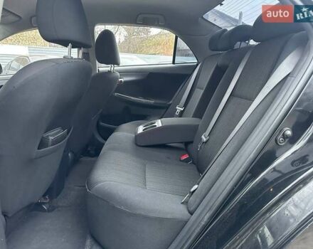 Чорний Тойота Королла, об'ємом двигуна 1.6 л та пробігом 316 тис. км за 7490 $, фото 9 на Automoto.ua