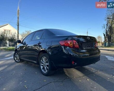 Чорний Тойота Королла, об'ємом двигуна 1.6 л та пробігом 193 тис. км за 5999 $, фото 37 на Automoto.ua