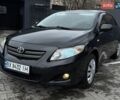 Черный Тойота Королла, объемом двигателя 1.6 л и пробегом 257 тыс. км за 6000 $, фото 1 на Automoto.ua