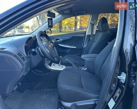 Чорний Тойота Королла, об'ємом двигуна 1.6 л та пробігом 193 тис. км за 5999 $, фото 12 на Automoto.ua