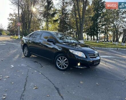 Чорний Тойота Королла, об'ємом двигуна 1.6 л та пробігом 193 тис. км за 5999 $, фото 40 на Automoto.ua