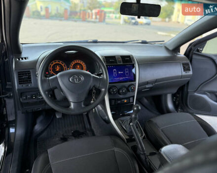 Чорний Тойота Королла, об'ємом двигуна 1.6 л та пробігом 221 тис. км за 6799 $, фото 5 на Automoto.ua