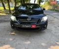 Чорний Тойота Королла, об'ємом двигуна 1.6 л та пробігом 340 тис. км за 4890 $, фото 1 на Automoto.ua