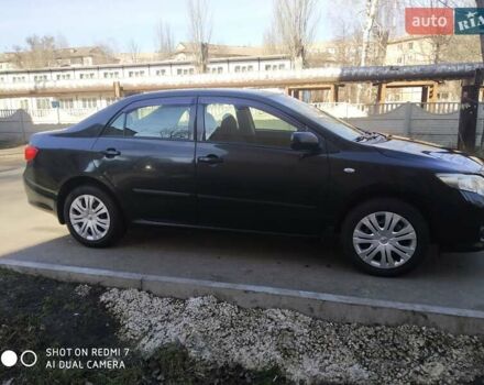 Чорний Тойота Королла, об'ємом двигуна 1.6 л та пробігом 215 тис. км за 7500 $, фото 2 на Automoto.ua