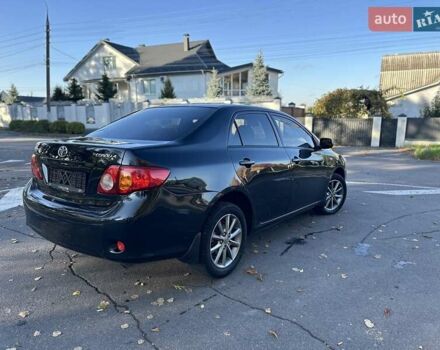 Чорний Тойота Королла, об'ємом двигуна 1.6 л та пробігом 193 тис. км за 5999 $, фото 43 на Automoto.ua