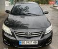 Черный Тойота Королла, объемом двигателя 1.6 л и пробегом 223 тыс. км за 6200 $, фото 1 на Automoto.ua
