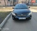 Черный Тойота Королла, объемом двигателя 1.6 л и пробегом 215 тыс. км за 7500 $, фото 1 на Automoto.ua
