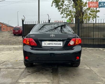 Чорний Тойота Королла, об'ємом двигуна 1.6 л та пробігом 316 тис. км за 7490 $, фото 5 на Automoto.ua