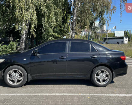 Чорний Тойота Королла, об'ємом двигуна 1.6 л та пробігом 316 тис. км за 7000 $, фото 7 на Automoto.ua