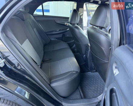 Чорний Тойота Королла, об'ємом двигуна 1.6 л та пробігом 221 тис. км за 6799 $, фото 7 на Automoto.ua