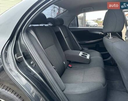 Чорний Тойота Королла, об'ємом двигуна 1.6 л та пробігом 316 тис. км за 7490 $, фото 10 на Automoto.ua