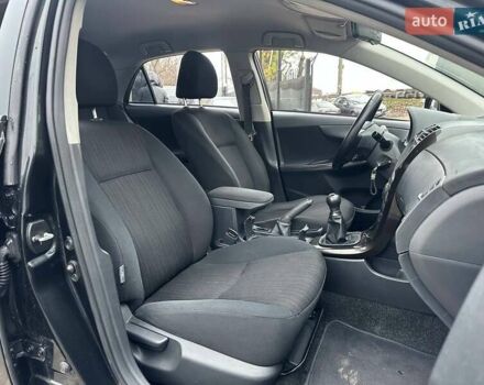 Чорний Тойота Королла, об'ємом двигуна 1.6 л та пробігом 316 тис. км за 7490 $, фото 11 на Automoto.ua