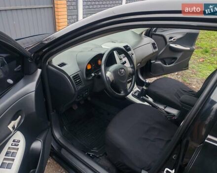 Черный Тойота Королла, объемом двигателя 1.6 л и пробегом 210 тыс. км за 6200 $, фото 1 на Automoto.ua