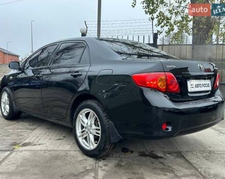 Чорний Тойота Королла, об'ємом двигуна 1.6 л та пробігом 316 тис. км за 7490 $, фото 6 на Automoto.ua