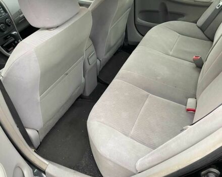 Чорний Тойота Королла, об'ємом двигуна 1.8 л та пробігом 205 тис. км за 5500 $, фото 6 на Automoto.ua